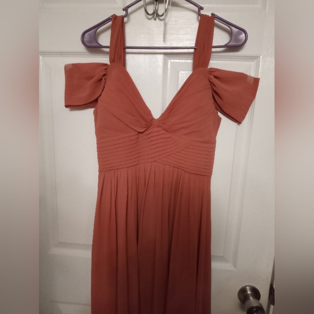 Beautiful burnt orange evening gown.